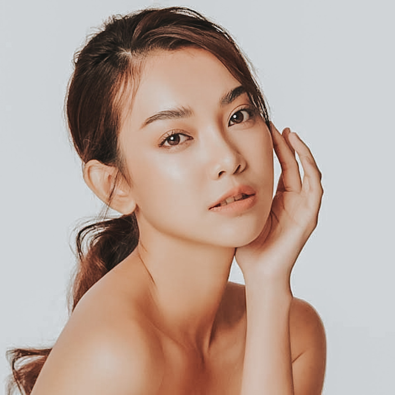 a beautiful asian women posing with her soft skin